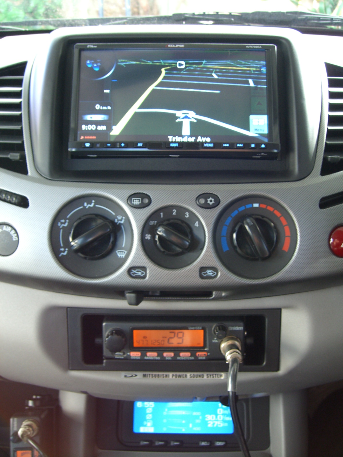 Mitsubishi_Triton_2009_Eclipse_DVD_navigation_relocate_trip_computer_head_up_display_to_bottom_of_dash_custom_install_unit_Uniden_UHF_cb_radion_pic5.jpg