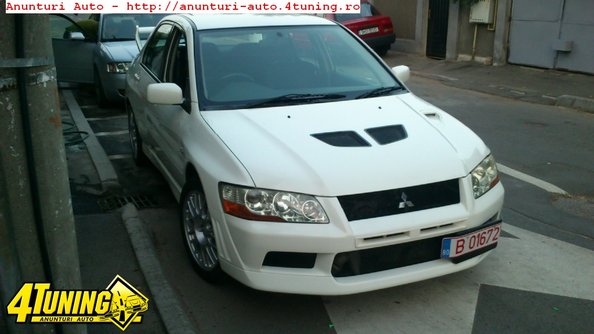 Mitsubishi_Lancer_Evolution_VII_1997_cmc.jpg